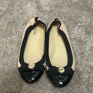 Michael Kors tan and black leather flats